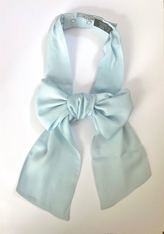 Denduon light blue signature bow in soft silky polyster on a white background