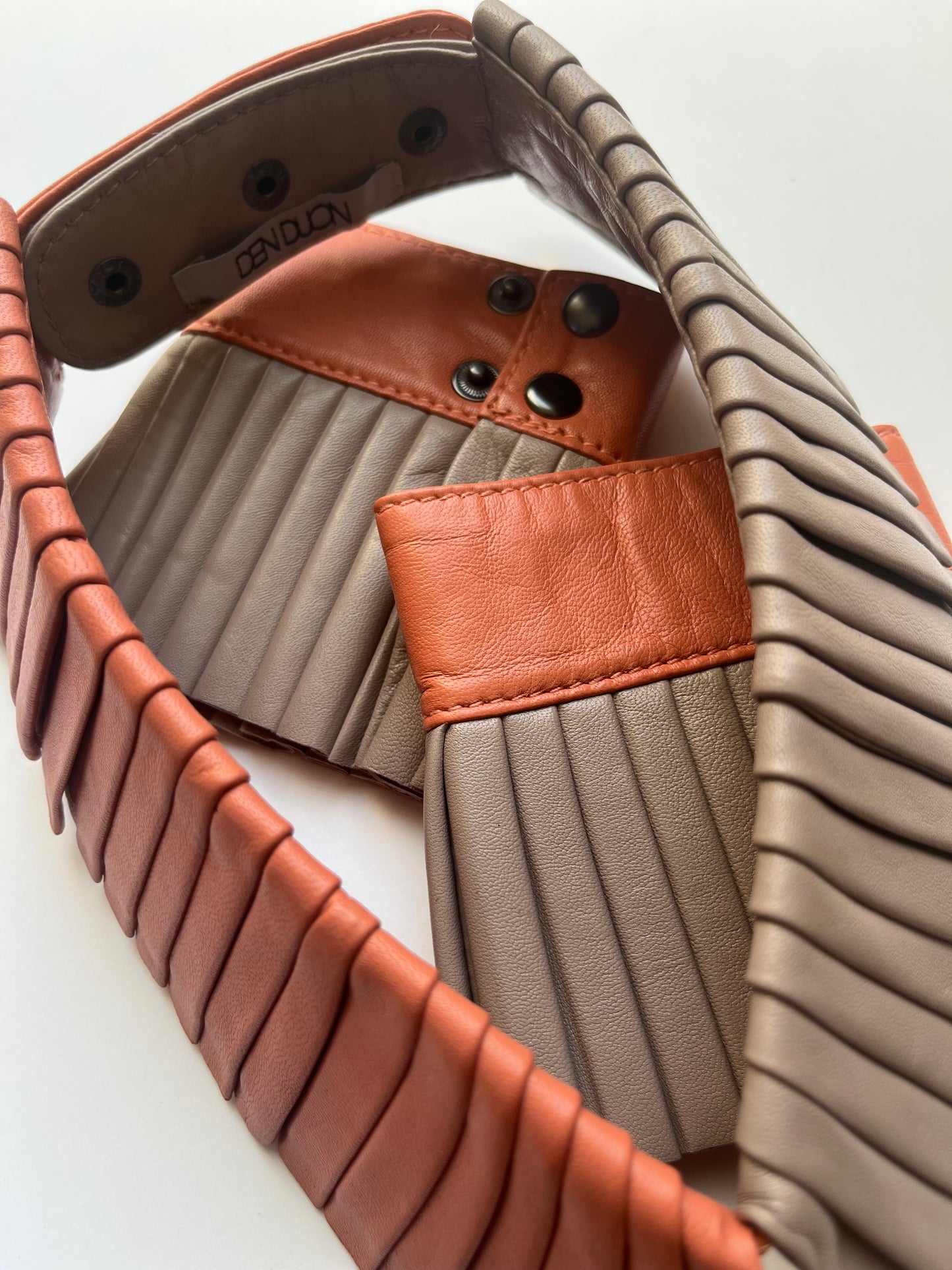 Denduon leather cuffs and collar in DUO colors Mushroom and Blooming Dahlia