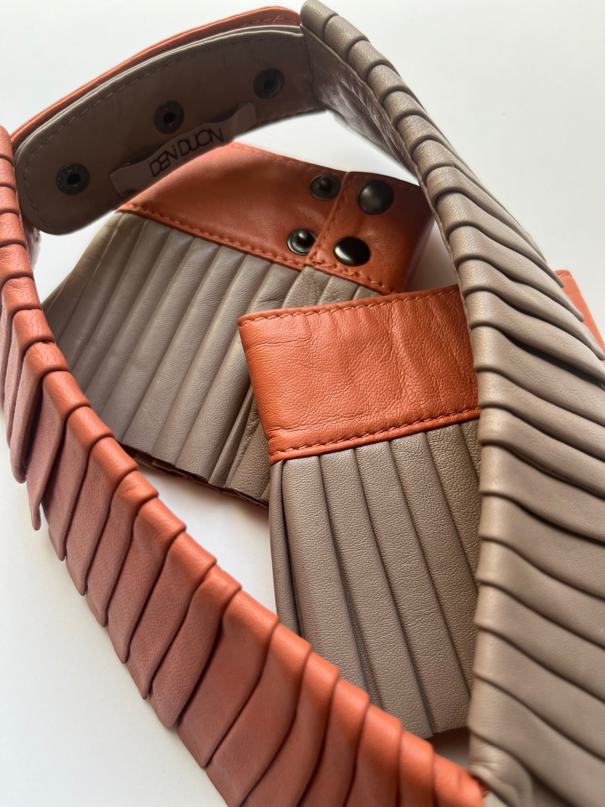 Denduon leather cuffs and collar in DUO colors Mushroom and Blooming Dahlia